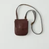 Kate Sheridan Leather Half Orbed Tab Bag